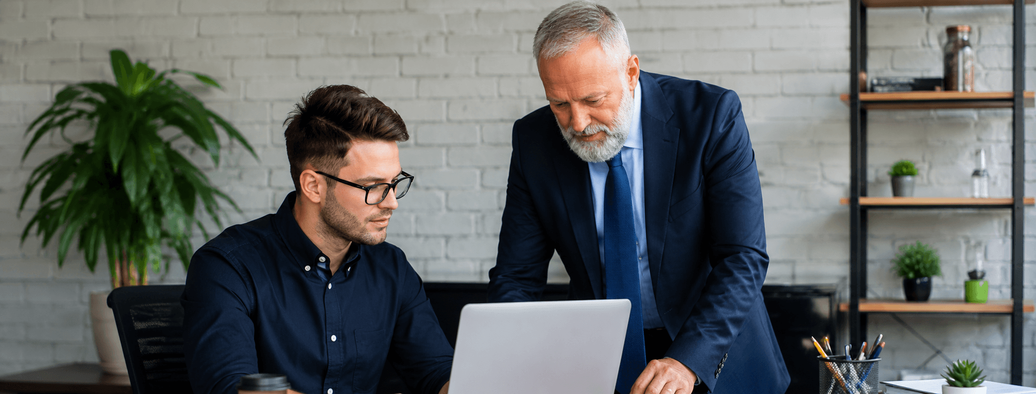 Business professionals in a formal meeting around table